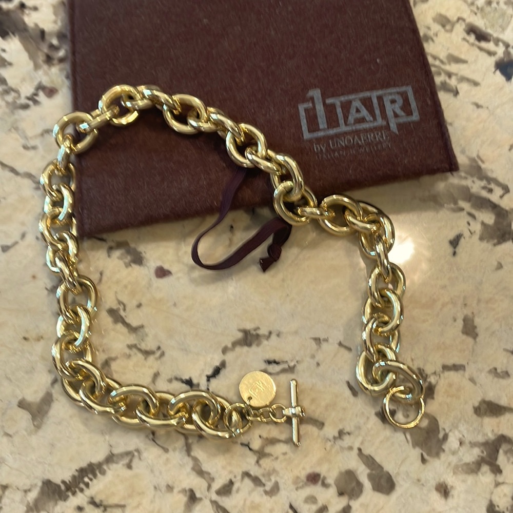1AR by unoaerre 18k gold plated necklace.  In new condition
